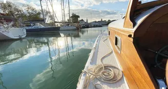 Tour de la baie sur un bateau traditionnel à moteur - Kapalouest Tour de la baie sur un bateau traditionnel à moteur - Kapalouest